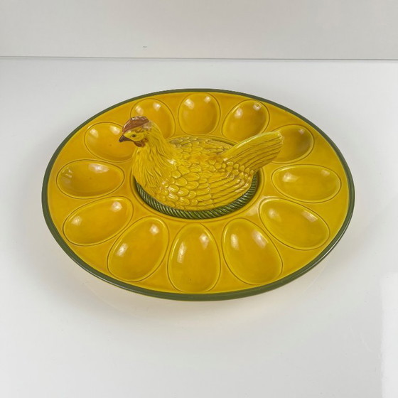 Image 1 of Yellow ceramic egg plate/display stand with hen, 20th century.