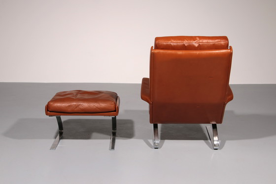 Image 1 of Cognac Leder COR Swing Lounge Stuhl mit Ottomane von Adolf & Schöpfer 1976