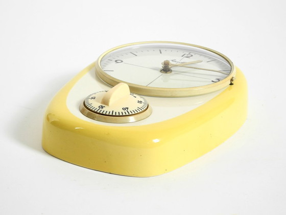 Image 1 of Beautiful battery-operated Mid-Century Modern wall clock by Mauthe with a glazed ceramic case