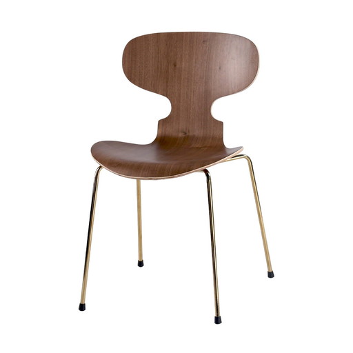 Silla escultural "Alas de Mariposa" – Nogal y latón pulido

