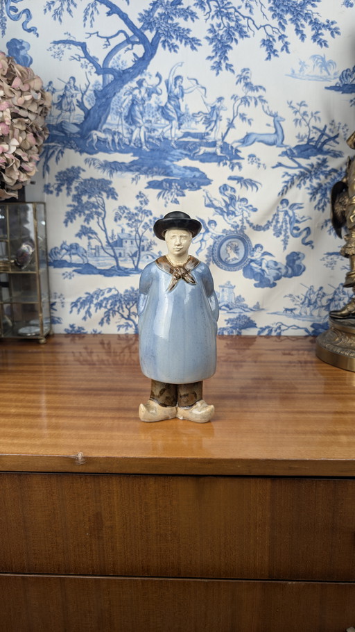 Denbac pour Noyer anthropomorphic liqueur bottle of a Berrichon shepherd, early 20th century ceramics