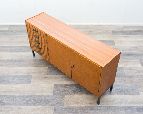 Image 1 of Teak sideboard from the 60s with grooved drawers.