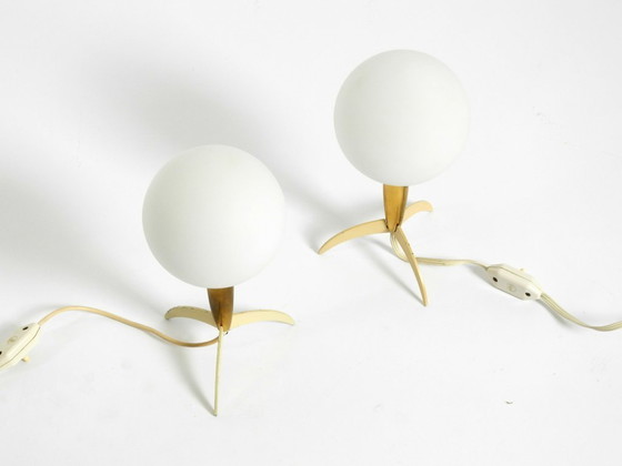 Image 1 of Two Mid-Century Modern rocket table lamps in brass and glass