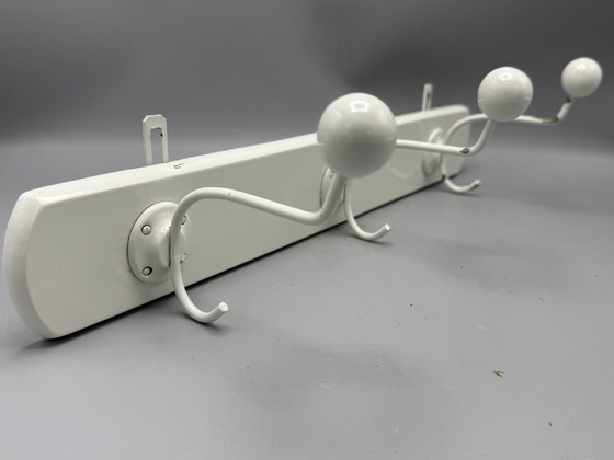 Image 1 of Mid - Century coat rack sleek and timeless design