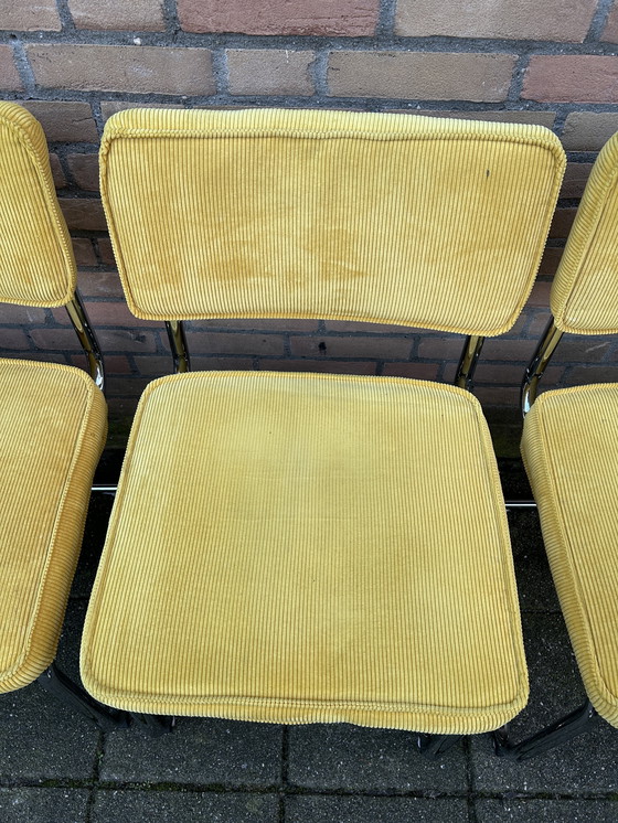 Image 1 of 6 sedie in tessuto a coste gialle con struttura tubolare cromata