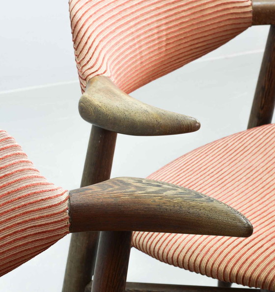 Image 1 of Authentieke Cowhorn Tijsseling eetkamerstoelen met wengé houten frame en steenrode bekleding door Hulmefa - Set van 4