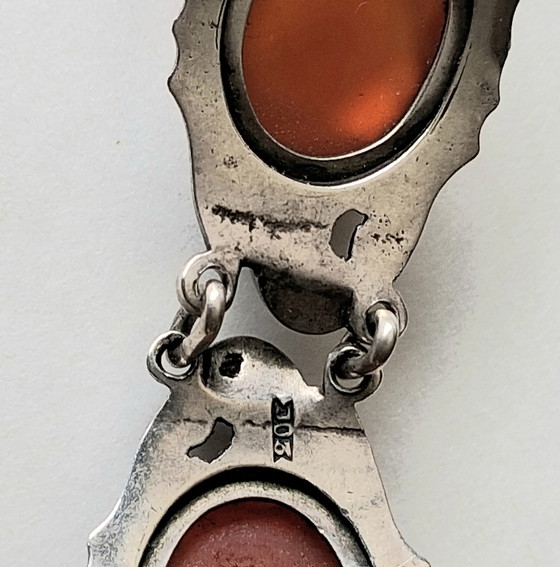 Image 1 of 3 antique silver jewelry pieces with faceted Carnelian stones and round-cut Baltic Amber.