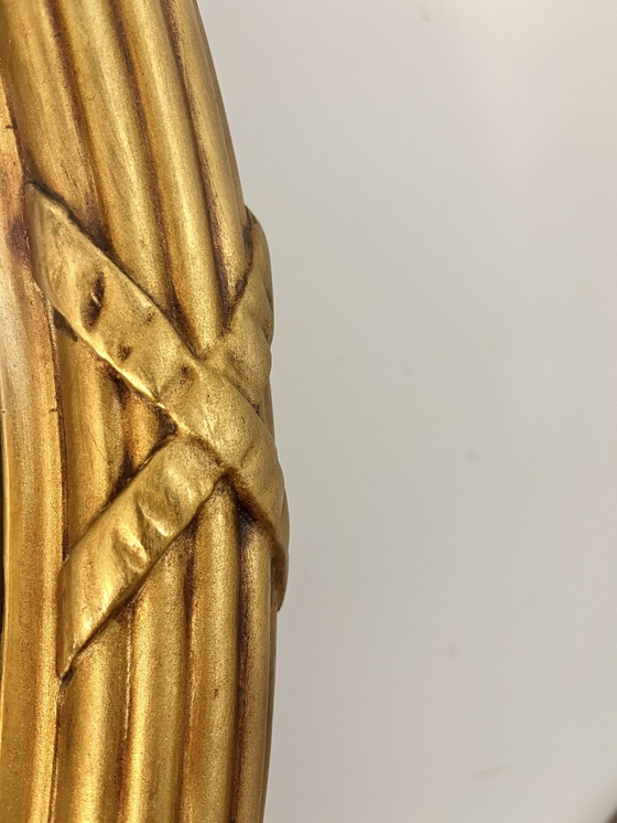 Image 1 of Espejo redondo antiguo con cresta 67x48cm