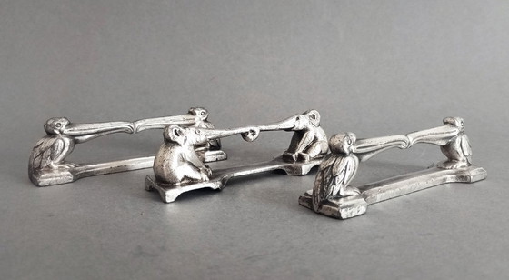 Image 1 of Société Francaise d'Orfèvrerie d'Art ARGIT/Christofle 3x art déco -éléphant pélicans- porte-couteau 1920