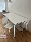 Ahrend table and two Revolt chairs