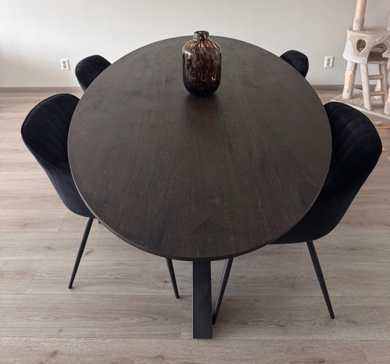Oval dining table with dark brown top and black base, Haco, Wood, Metal, Modern (photo 2 of 7)