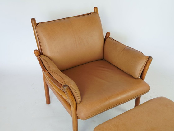 Image 1 of Illum Wikkelsoe teakhouten lounge stoel en kruk vintage design jaren 60