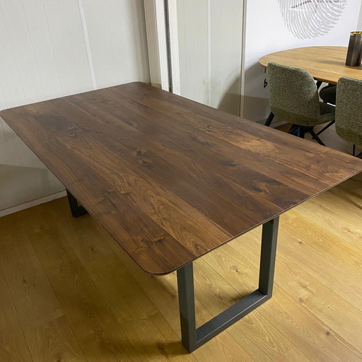 Conversazione a tavola Q