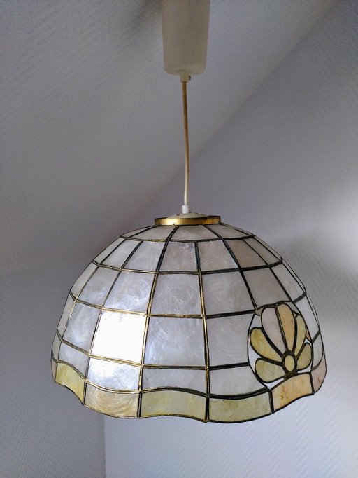 Mother-of-pearl and brass suspension