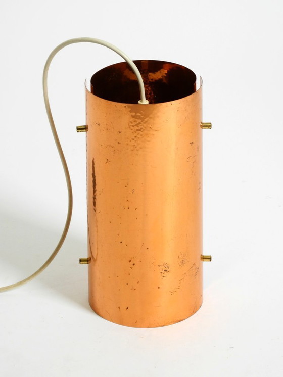 Image 1 of Two rare mid-century tube pendant lamps consisting of two screwed-together copper bowls