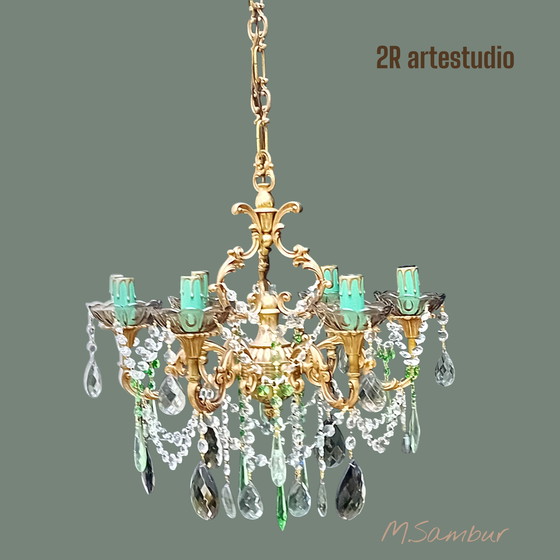 Image 1 of Lámpara de araña con cristal de topacio rojizo.