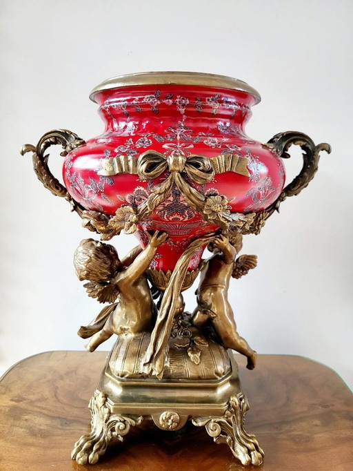 Impressive bronze jardiniere with baroque-style putti