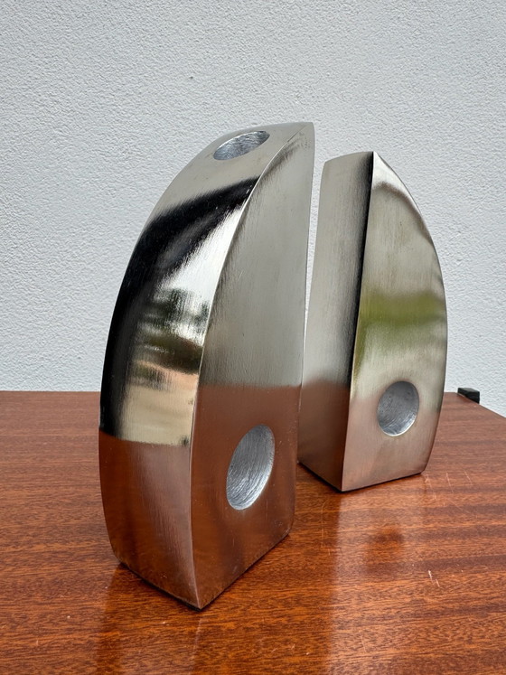 Fermalibri portacandele in alluminio cromato – Oggetti decorativi (photo 12 of 13)