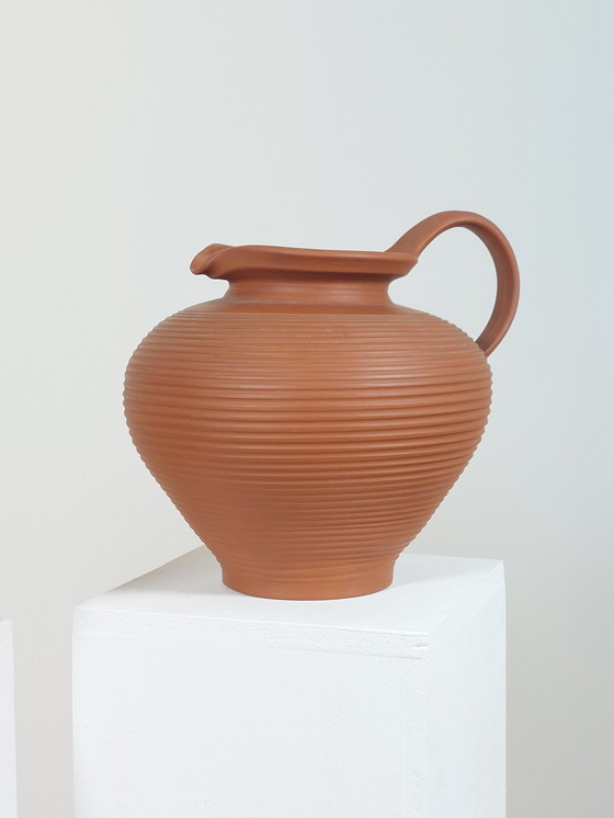 Image 1 of Pair of handmade vintage terracotta handled vases