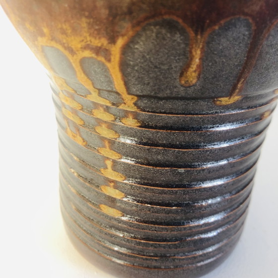 Image 1 of Vaso a torso in ceramica smaltata metallizzata