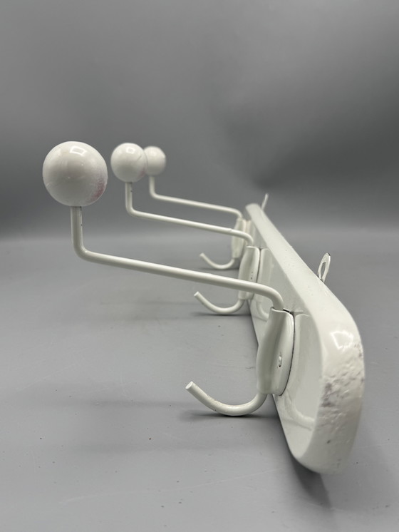 Image 1 of Mid - Century coat rack sleek and timeless design