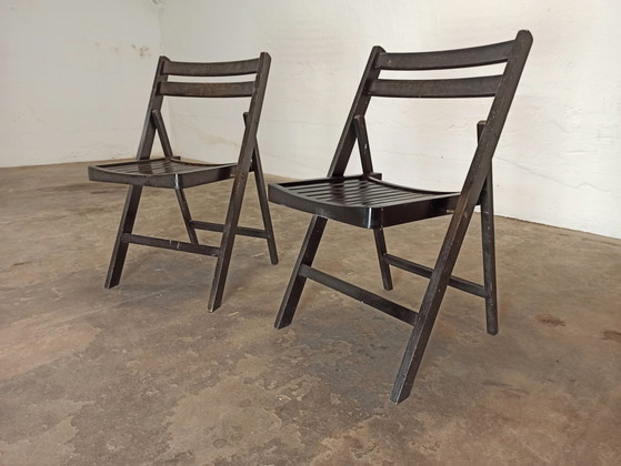Image 1 of 2 vintage zwarte houten klapstoelen