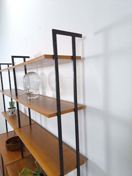 Image 1 of Parete componibile Omnia, Hilker, teak e acciaio nero con ripiani e contenitori