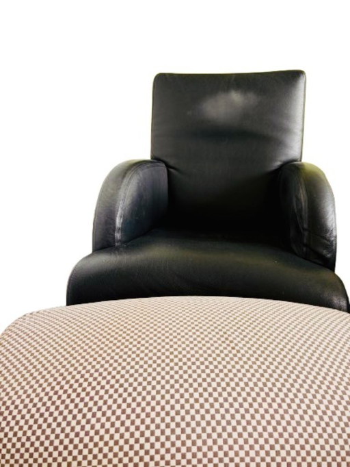 Designfauteuil "Oriente" + voetenbank