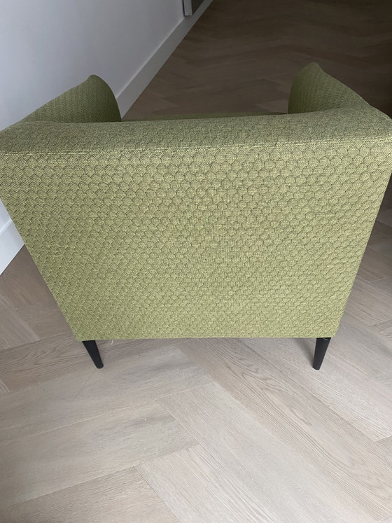 Image 1 of Sijben armchair in moss green fabric with matte black steel legs.