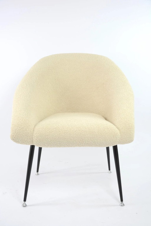 Beige bouclé kuipstoel
