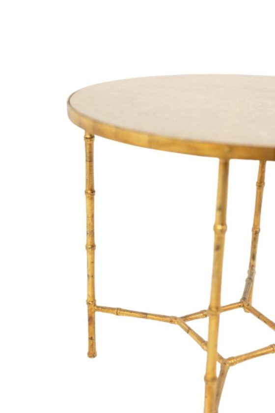 Image 1 of Pedestal table. Gilt metal base and grey marble top. 20th century.