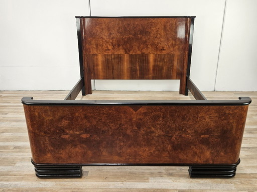 Art Decò double bed in mahogany burl with ebonized profiles