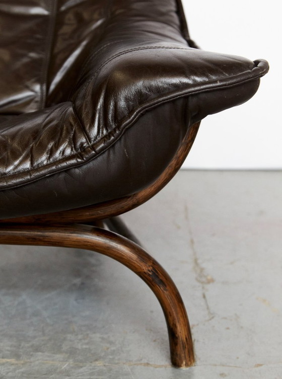 Image 1 of Fauteuil en voetenbank van bamboe en leer