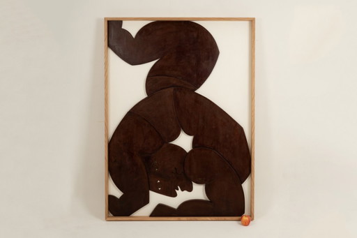 Bas-relief panel "The Twins" in patinated wood. Contemporary