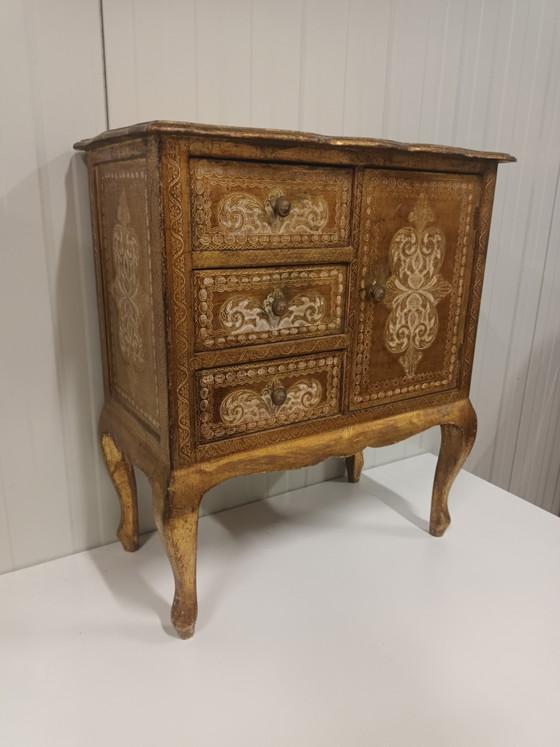 Image 1 of Gold-colored Florentine chest of drawers