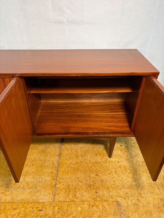 Image 1 of Mid Century Retro Teak Sideboard by Elliotts of Newbury Circa 1960  A stunning mid century modern sideboard
