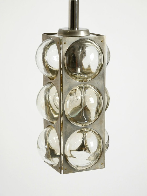 Image 1 of Beautiful 1960s Space Age pendant lamp by Temde, made of glass and nickel-plated metal