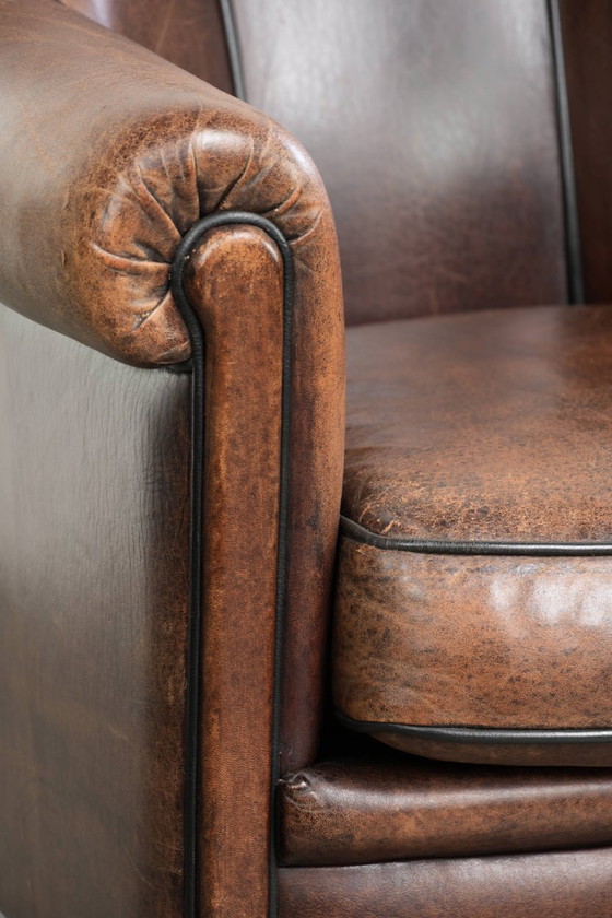 Characterful and comfortable vintage sheepskin armchair with a unique design and a timeless look – Leather (photo 11 of 15)