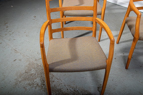 Image 1 of J.L. Mollers Model 68 armchairs in Oak with original fabric. Made in Denmark Circa 1990