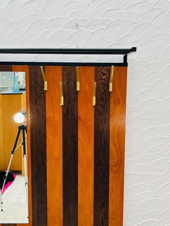 Image 1 of Vintage wandkast met opbergbankje uit de jaren 70.