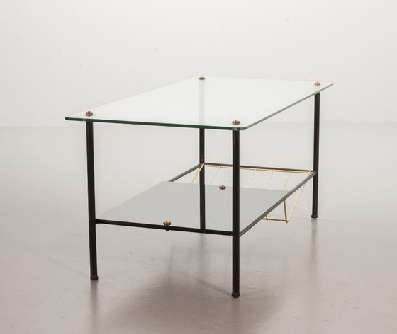 Image 1 of Mid-Century Pierre Guariche Glass Coffee / Side Table for Airborne in Black Steel with Brass Magazine Holder. France, 1950s. 