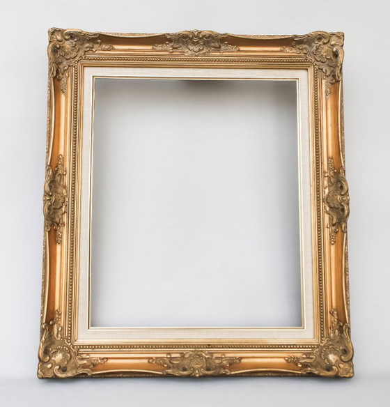 Image 1 of Antique Baroque wooden frame, patinated with gold leaf, handmade, Louis XVI style. Baroque frame for a painting, mirror, etc.