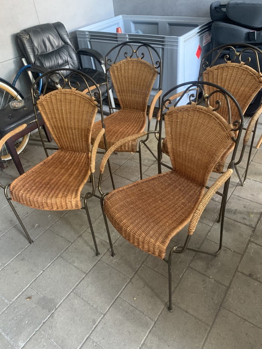 4 chaises en fonte avec rotin