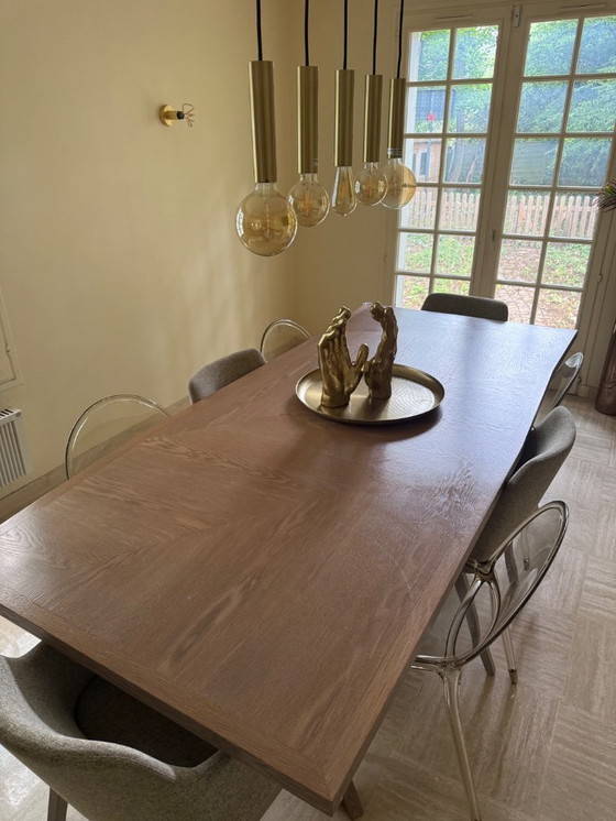 Image 1 of roche bobois dining table and 8 roche bobois chairs