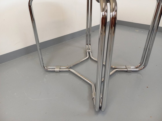 Image 1 of Round vintage dining table in smoked glass and chromed metal in the Space Age style of the 70s