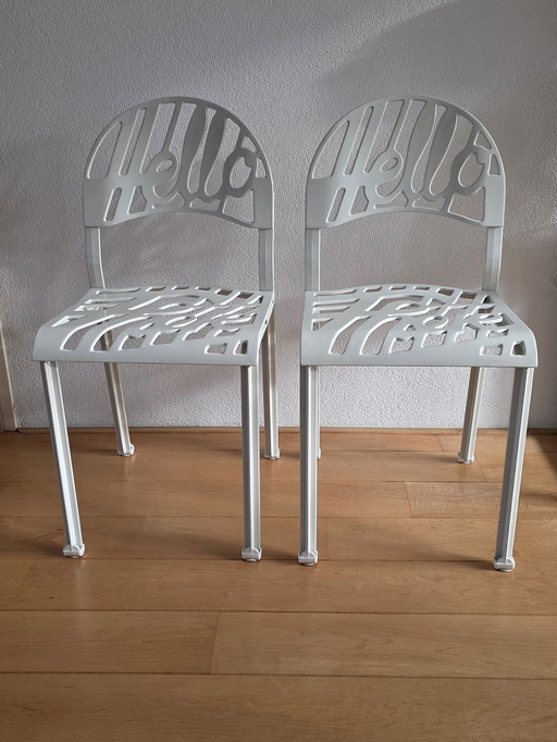 2 white aluminum "Hello There" chairs designed in 1978 by Jeremy Harvey