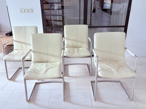4x chaise à structure tubulaire avec cuir
