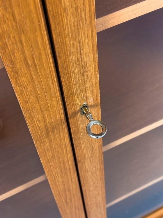 Image 1 of Mobiletto in teak con ante in vetro di WK Möbel, anni '70