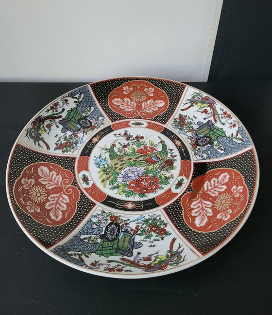 Image 1 of Piatto giapponese in ceramica Imari con motivo a pavone.