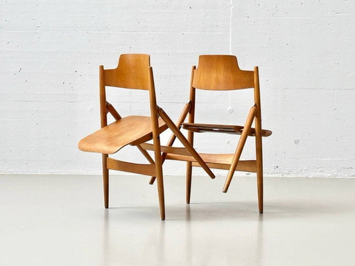 2 sillas plegables SE 119 de Egon Eiermann para Wilde + Spieth